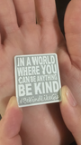 Custom forged and hand painted " IN A WORLD WHERE " lapel pin